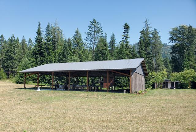 Timber-frame pavilion in the meadow
